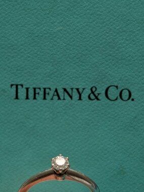 Tiffany & Co platinum band round brilliant .24 carat diamond ring, size 6